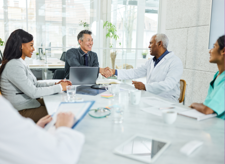 Team sitting around conference table