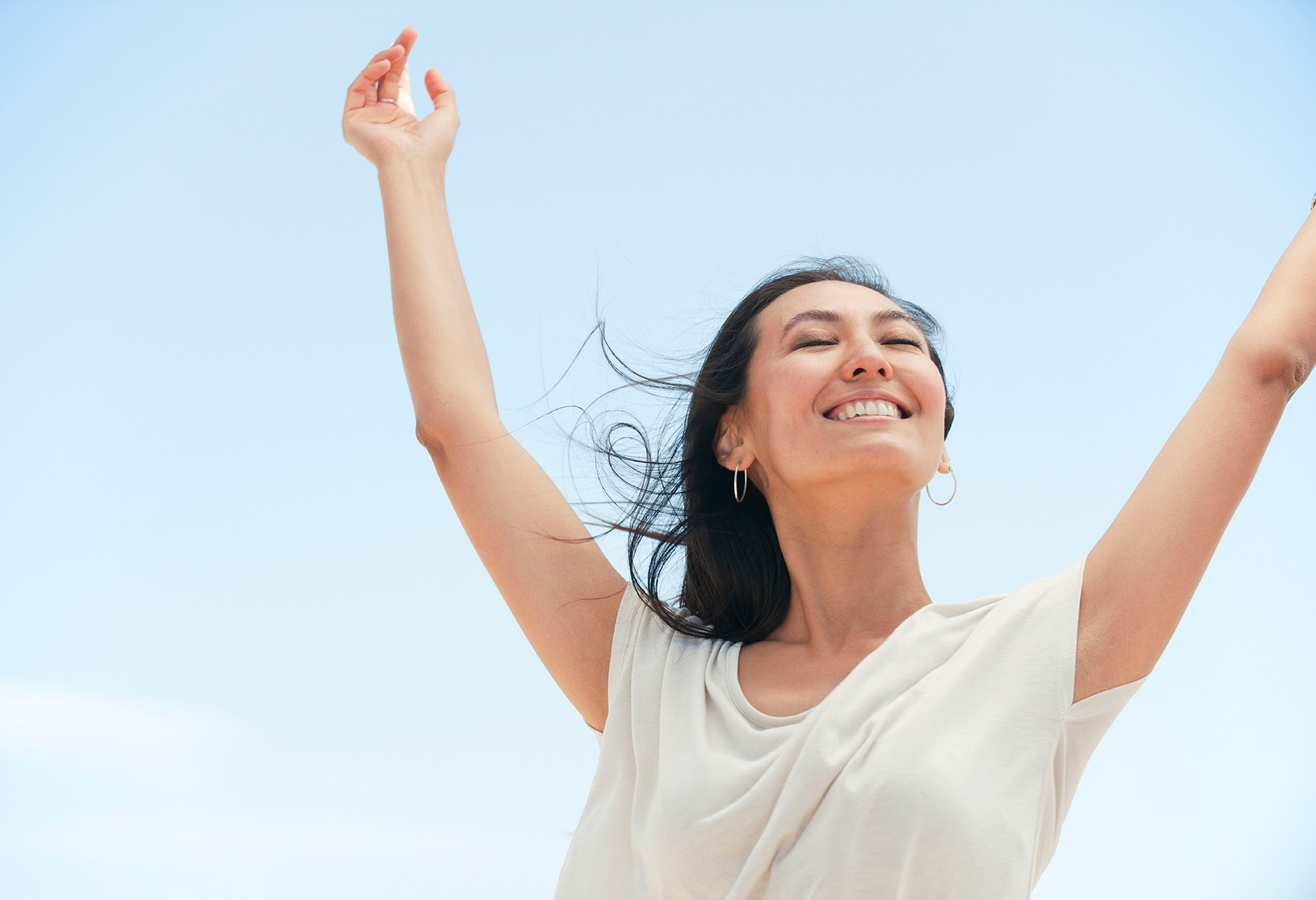 woman basking in the sun enjoying her health